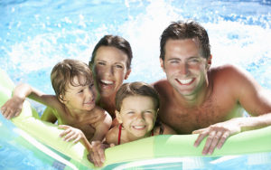 Family In Pool